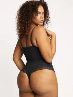 Shapewear Lace Deep-V Neck Bodysuits or Faux Leather Skirts